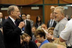 Sen. Arlen Specter, D-Pa., left, listens to an unidentified man voice his complaints during a town hall meeting in Lebanon, Pa., in August 2009. Photo by Bradley C. Bower/The Associated Press.  Yep, this is pretty much how it went for me today.