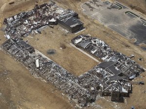 The new Vilonia Intermediate School was nearly completely flattened by the Sunday tornado. Image by Carlo Allegri, Reuters.