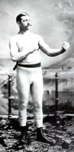 Compromise? The greater good? Them's fightin' words! Image of bare-knuckles fighter John L. Sullivan from Wikipedia.