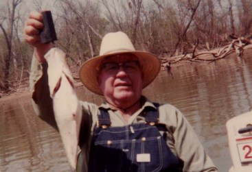Grandpa fished, too. I always remember him like this (minus the fish).