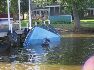 In the vernacular of my people, "That there bot done tumped over!"  Image from gfmarine.com.