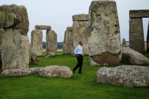 Well, he DID visit Stonehenge last week ... Image by Charles Dharapak, AP.