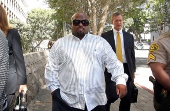 Cee Lo Green leaves Los Angeles Superior Court after a hearing on Aug. 29. He pleaded no contest to drug charges and received three years' probation and community service. Image by Nick Ut, AP.