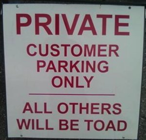 There are distinct dangers to parking in front of a witchcraft shop if you're not going in there. Image found on Bay of Fundie.
