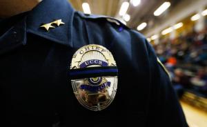 Chief Brian McPike of the University of Colorado-Colorado Springs police force attends a vigil at the university. Image by David Zabulowski, Associated Press.