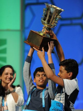 Careful, Jairam ... it looks like Nihar is contemplating tipping that trophy over onto your head. Image by Christopher Powers, USA Today.