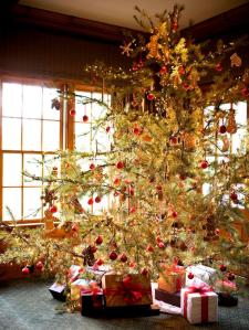Sorta like the trees we'd have. A lot of red cedars grew around the fence line and in the backyard of the community building, and sometimes one of them would end up as the Christmas tree. Image found on Pinterest.