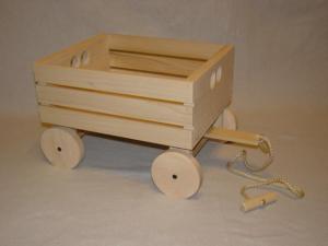 I imagine George's wagon looked a bit like this; simple, but made with love. Image found on My Unique Wooden Toys.